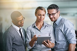 Cropped shot of three businesspeople working on a digital tablethttp://195.154.178.81/DATA/i_collage/pi/shoots/783721.jpg