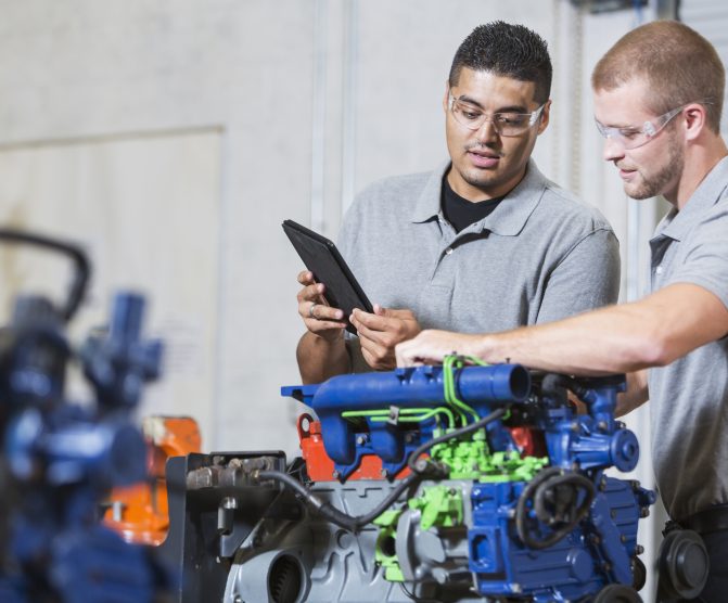 Engineers using their IFS Cloud systems to navigate remanufacturing.